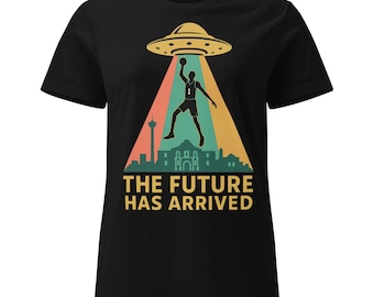 May include: Black t-shirt featuring a basketball player being beamed up by a UFO. The design includes a cityscape silhouette and the text "THE FUTURE HAS ARRIVED" in yellow and white.