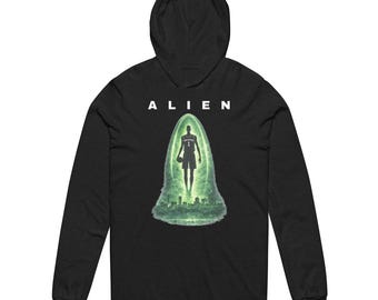 May include: Black hooded sweatshirt with the word "ALIEN" in white block letters across the chest. A green graphic depicts a basketball player inside a glowing oval, above a cityscape.