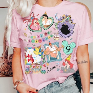 Puede incluir: Camiseta rosa con personajes de La Sirenita de Disney. El dise&ntilde;o tiene un tema de cumplea&ntilde;os con el texto "It's My Birthday" y un globo con el n&uacute;mero 9. Varios personajes est&aacute;n enmarcados en bordes decorativos.