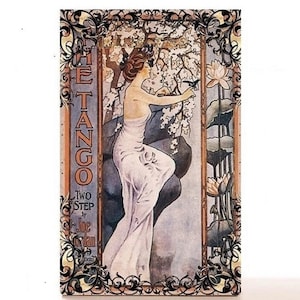 May include: Vintage poster with an ornate frame featuring a woman in a white dress with a floral background. The text on the poster reads "The Tango Two Step by Joe Jordan".