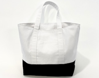 100% Cotton Canvas Tote Bag In White And Black Color Block - 2 Outside Pockets 2 Inside Pockets And Laptop Pocket
