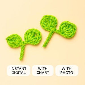 May include: Two handmade, bright green crochet sprout shapes on a light yellow background. The sprouts have a detailed, textured appearance, with rounded leaves and slender stems. The image also includes text that reads "INSTANT DIGITAL", "WITH CHART", and "WITH PHOTO".