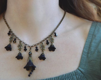 Black flower necklace gothic fairy style pendant with crystals and bronze chain, dark forestcore romantigoth jewelry with flowers and leaves