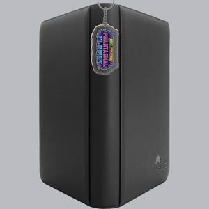 May include: A black, rectangular storage box with rounded corners. A keychain with a colorful, stylized logo that reads "Phantasmal Flames" hangs from the top. The box has a subtle logo on the lower right corner.