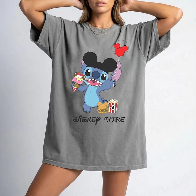 May include: A set of three ceramic mugs with a speckled, matte finish. The mugs are in shades of cream, light gray, and dark gray. Each mug has a simple, minimalist design and a rounded handle.