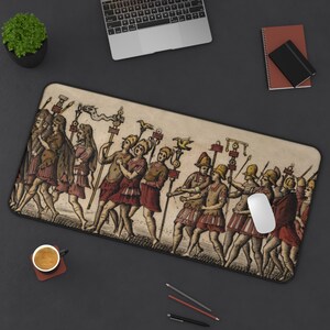 May include: A rectangular desk mat featuring a historical illustration of a procession of soldiers in ancient armor, wearing helmets and carrying tall standards with decorative tops. The scene is rendered in muted earth tones, including shades of brown, red, and tan, depicting a group of figures walking in a line across the surface.