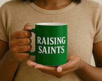 Raising Saints Mug | Christian Mom Coffee Cup | Catholic Motherhood Gift | Faith Based Parenting Mug | Religious Mom Gift