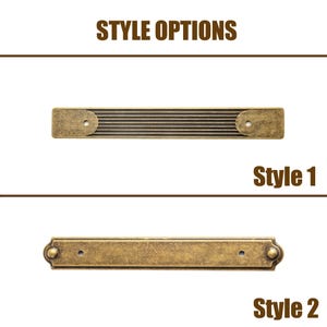 May include: Two antique brass-toned metal drawer pulls. The top pull, labeled "Style 1," has a ribbed design. The bottom pull, labeled "Style 2," is a flat bar with decorative ends. The text "STYLE OPTIONS" is at the top.