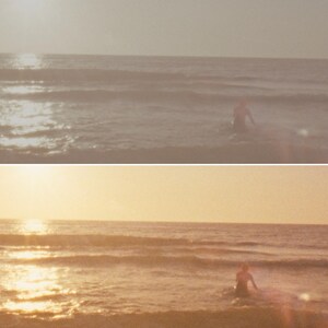 Puede incluir: Una escena de playa serena con una persona vadeando en el oc&eacute;ano. El sol se refleja en el agua, creando un efecto brillante. El cielo es de un color suave y apagado, y el tono general es c&aacute;lido y acogedor.