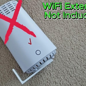 May include: A white WiFi extender with a red X drawn over it, and the text "WiFi Extender Not Included!" in green. The extender has a Verizon logo and a small white stand.