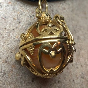 Vintage Golden Bronze Healing Stone Cage Locket image 1