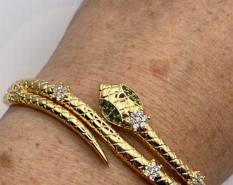 Bracelet jonc serpent vintage, yeux de cristal verts remplis d'or