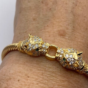 Bracelet jonc chat cougar vintage, yeux de cristal verts remplis d'or