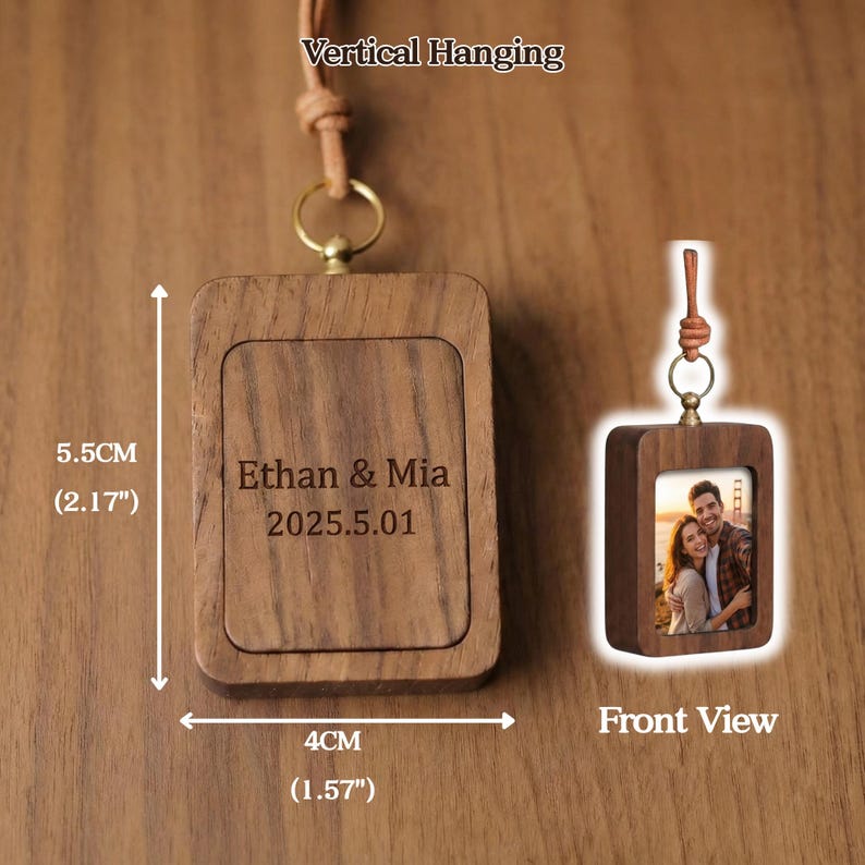 May include: A wooden photo frame with a leather strap for vertical hanging. The frame is 5.5 cm (2.17") tall and 4 cm (1.57") wide. The text "Ethan & Mia 2025.5.01" is engraved on the frame. A smaller frame shows a couple's photo.