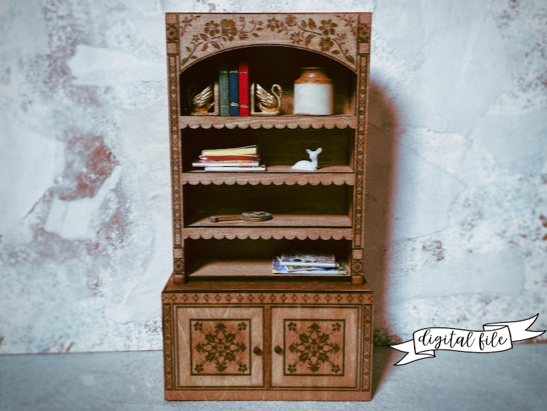 laser cut dollhouse bookshelf with intricate engravings and scalloped shelves
