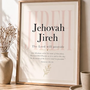 Puede incluir: Una impresión enmarcada con las palabras "Jehovah Jireh" en letras negras y rosas. La frase "The Lord will provide" está debajo, junto con un versículo bíblico y una ramita de hojas. El marco es de color marrón claro.