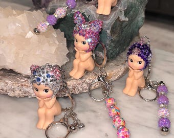 Llaveros/dijes para bolso con diamantes de imitación deslumbrantes de Sonny Angels personalizados