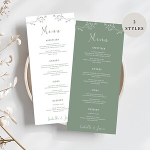 Può includere: Due biglietti per il menu di nozze, uno bianco e uno verde salvia, con decorazioni floreali. I menu elencano antipasti, antipasti, contorni e dessert. I nomi "Isabella & Jason" sono stampati in fondo a ogni biglietto.
