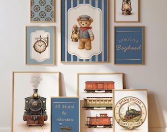 May include: A collection of framed vintage-style art prints featuring trains, a teddy bear, and other related imagery. The prints include a train engine, train cars, a clock, and text that reads "Long Live Boyhood" and "Steam Engine Express Line".