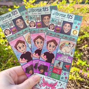May include: Three identical rectangular sticker sheets featuring Jerma985 themed illustrations. Designs include a smiling cartoon character, a cat named Frankie Sundae, a hamburger, an onion ring, rats, and text reading Sparkle on!, OTTO!, and MODS, BAN THAT GUY FOR 2 MINUTES.