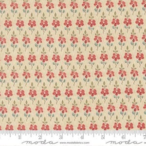 May include: Cream-colored fabric with a repeating pattern of red flowers and green leaves. The flowers are arranged in a diamond pattern. A ruler is at the bottom of the image, with the word "moda" printed on it.