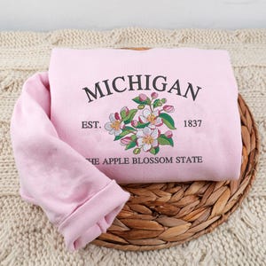 May include: A rustic wooden sign with the text "Welcome to our home" in a handwritten style. The sign is rectangular, with a distressed finish, and features a simple, inviting design. It's suitable for indoor or outdoor use.