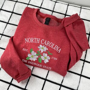 Embroidered Dogwood flower on heather sweatshirt