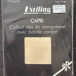 May include: A package of Exciting Paris Capri tights in a creme color, size 1. The black packaging features the text "COLLANTS STRUMPFHOSEN TIGHTS COLLANT", "Exciting PARIS", "CAPRI", and "Collant très fin transparent avec bande confort".