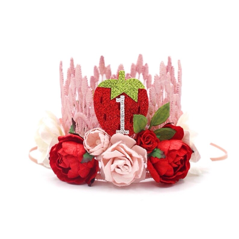 Pink lace strawberry first birthday crown with red and blush flowers, glittery strawberry topper, and number one detail. Perfect for a Sweet One birthday, berry first birthday, cake smash photoshoot, or toddler party hat. Handmade and customizable.