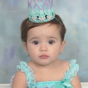 lavender and aqua ombre first birthday mermaid lace crown with gold starfish, and gold sparkly "one"