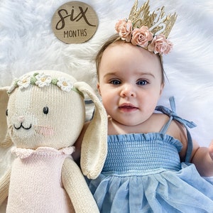 gold lace half birthday crown with white sparkly "1/2" and pale pink roses.