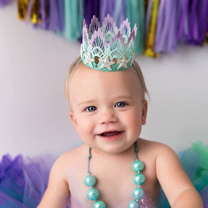 lavender and aqua ombre first birthday mermaid lace crown with gold starfish, and gold sparkly "one"