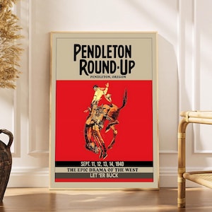 May include: A framed vintage poster for the Pendleton Round-Up rodeo event. The poster features a cowboy riding a bucking bronco against a red background. Text includes "PENDLETON ROUND-UP" and "SEPT. 11, 12, 13, 14, 1940".