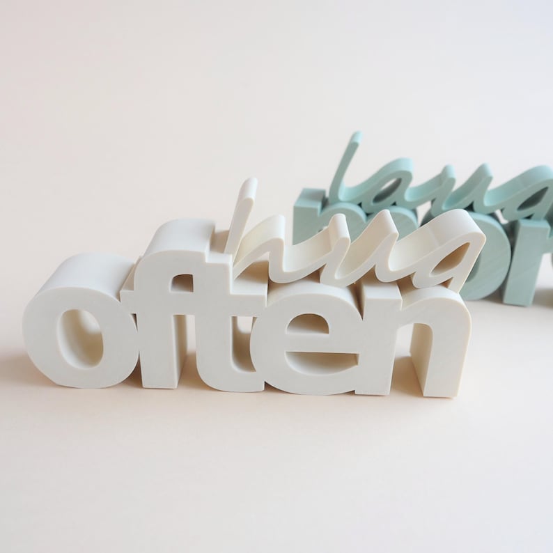 3D printer files home decoration set featuring a Hug Often sign with 3D lettering print file
