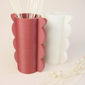 Modern small flower vase with scalloped edges, 3D print model displayed on neutral background
