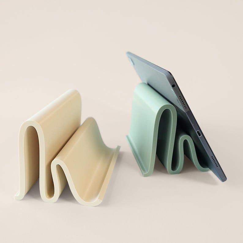 3D printed tablet stand for workspace organization.