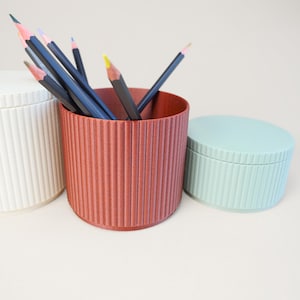 3D printed storage containers for desk, shelves, and small household items.