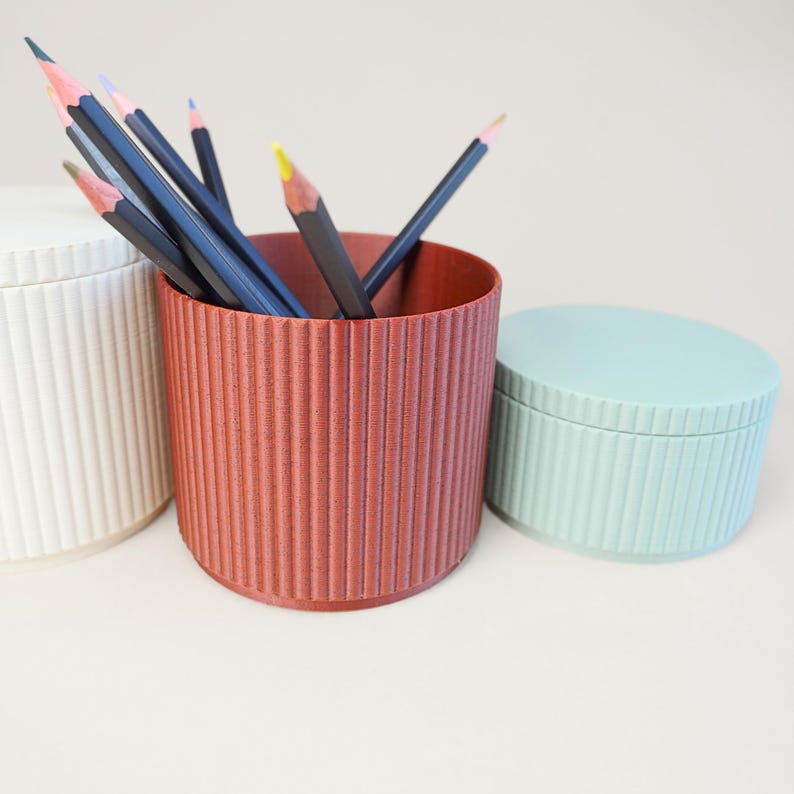3D printed storage containers for desk, shelves, and small household items.