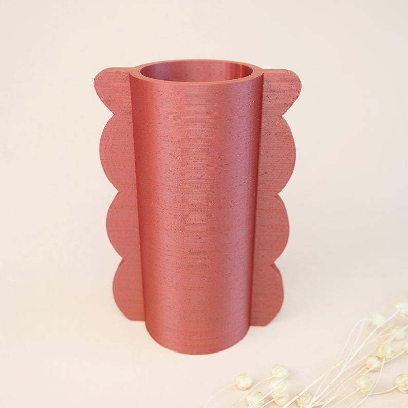 Red scalloped vase 3D print with curved shape and decorative side details