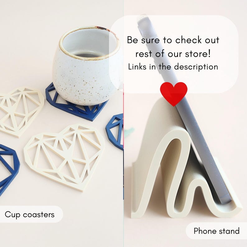 May include: The image showcases a collection of heart-shaped cup coasters in white and blue, alongside a white phone stand. A ceramic cup sits atop a blue coaster. Text reads: "Be sure to check out rest of our store! Links in the description."