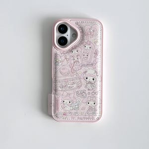 May include: Pink phone case featuring a My Melody design. The case has a light pink border and a detailed pattern of My Melody characters and related illustrations. The design is in a soft, pastel color palette.