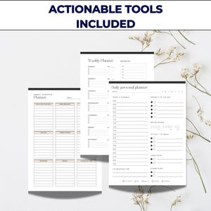 May include: A collection of white and black planners with the text "ACTIONABLE TOOLS INCLUDED". The planners include a weekly planner, a daily personal planner, and a smart shopper planner. The planners have sections for scheduling, priorities, and meal planning.