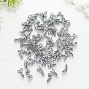 Silverfärgade blushakar och -öglor, klädfästen för sömnad, 50 eller 100-delars förpackning