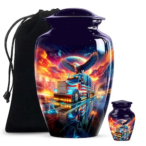 May include: A navy blue cremation urn with a vibrant design featuring an eagle, a semi-truck with an American flag, and a cityscape. A smaller matching urn is also present, along with a black drawstring bag.