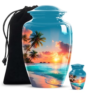 May include: A turquoise cremation urn and a smaller keepsake urn, both with a tropical beach scene of palm trees, a sunset, and ocean waves. A black drawstring bag is on the left. The urns are glossy and reflective.