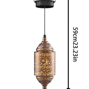 May include: Bronze-colored hanging lantern with a decorative cut-out design featuring a sun and moon motif. The lantern is 4.41 inches wide and 23.23 inches long, with a black top and handle.