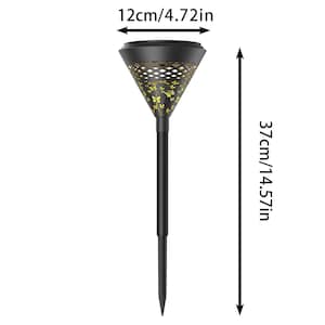 May include: Black solar-powered garden light with a decorative butterfly pattern. The light is 14.57 inches tall and 4.72 inches wide. The top of the light has a cone shape with a decorative pattern. The light has a stake for easy placement in the ground.