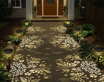 Luces decorativas solares para jardín, luces de paisaje impermeables con luz cálida.