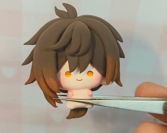 Handmade Zhongli mini clay chibi with soft shading, fluffy hair layers