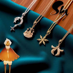 May include: Four necklaces with pendant charms. One silver necklace features a crescent moon and star pendant. The other three are gold-toned, with a castle, snowflake, and floral design. The word "Sky" is in the upper right corner.